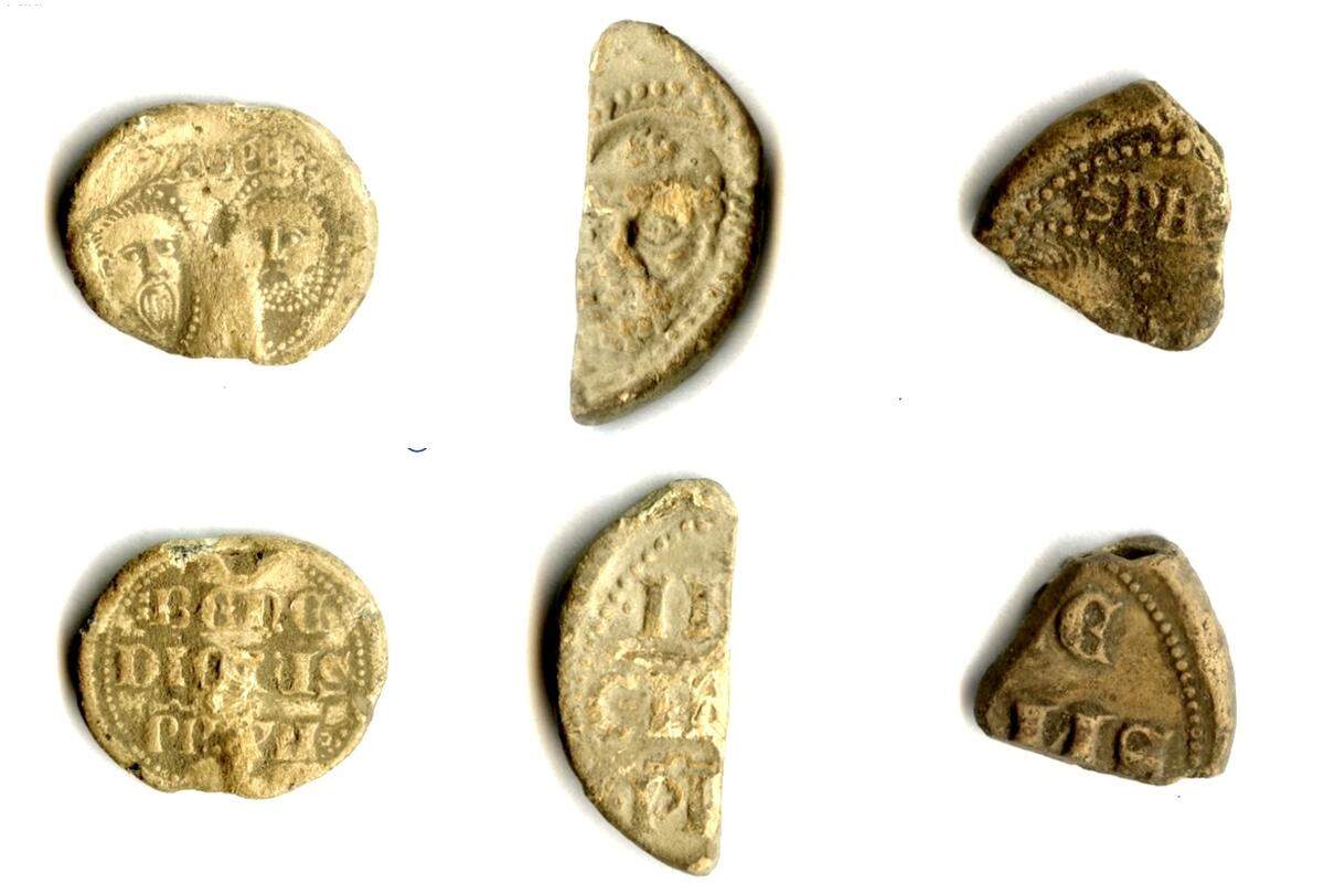 The three medieval papal bulla, or lead seals, in the collection of the Museum of the History of the Kamień Land. Photos show both sides of the seals.