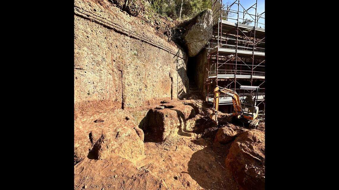 Archaeologists uncovered a massive Etruscan structure while cleaning overgrown plants at the ancient rock necropolis of San Giuliano, photos show.