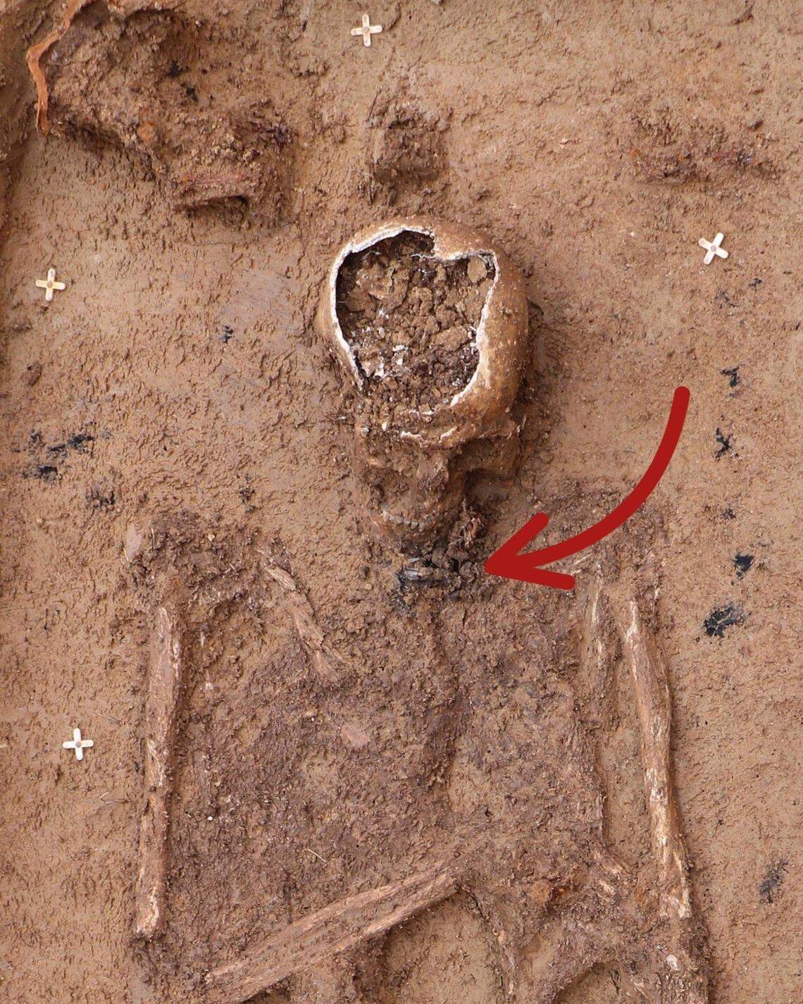 The ancient amulet seen during excavations of the grave in Frankfurt.