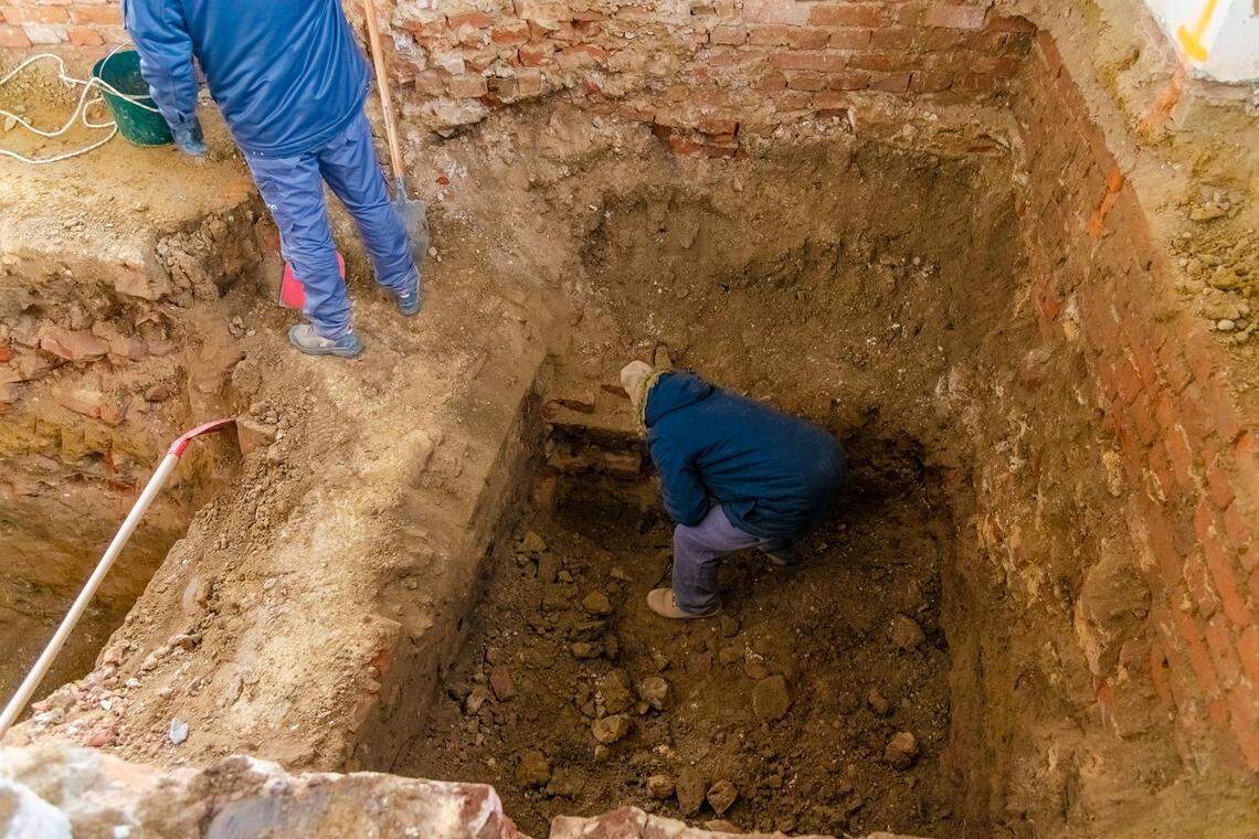 Workers digging under the Čazma City Museum and Cultural Center.