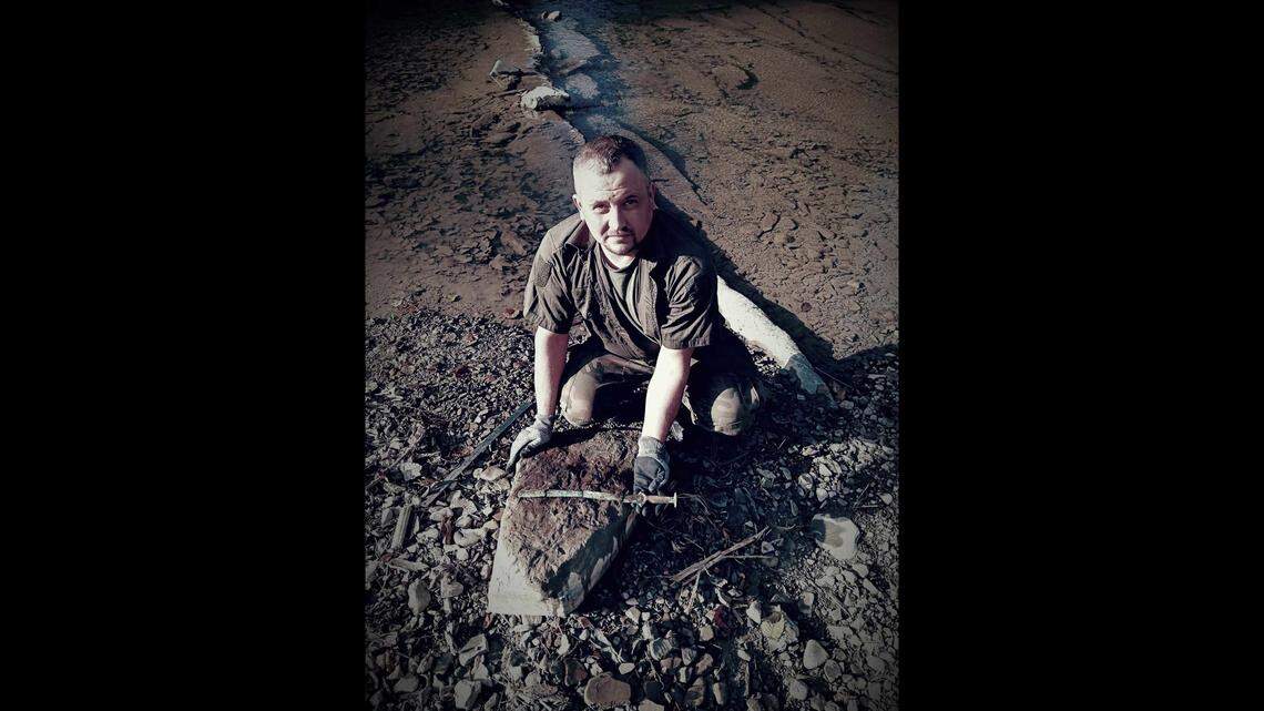 A man searching for World War artifacts with a metal detector unearthed a unique 3,000-year-old weapon, photos show.