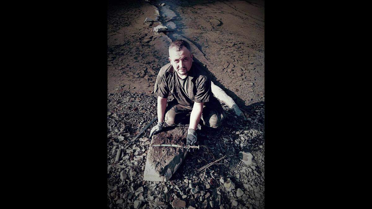 A man searching for World War artifacts with a metal detector unearthed a unique 3,000-year-old weapon, photos show.