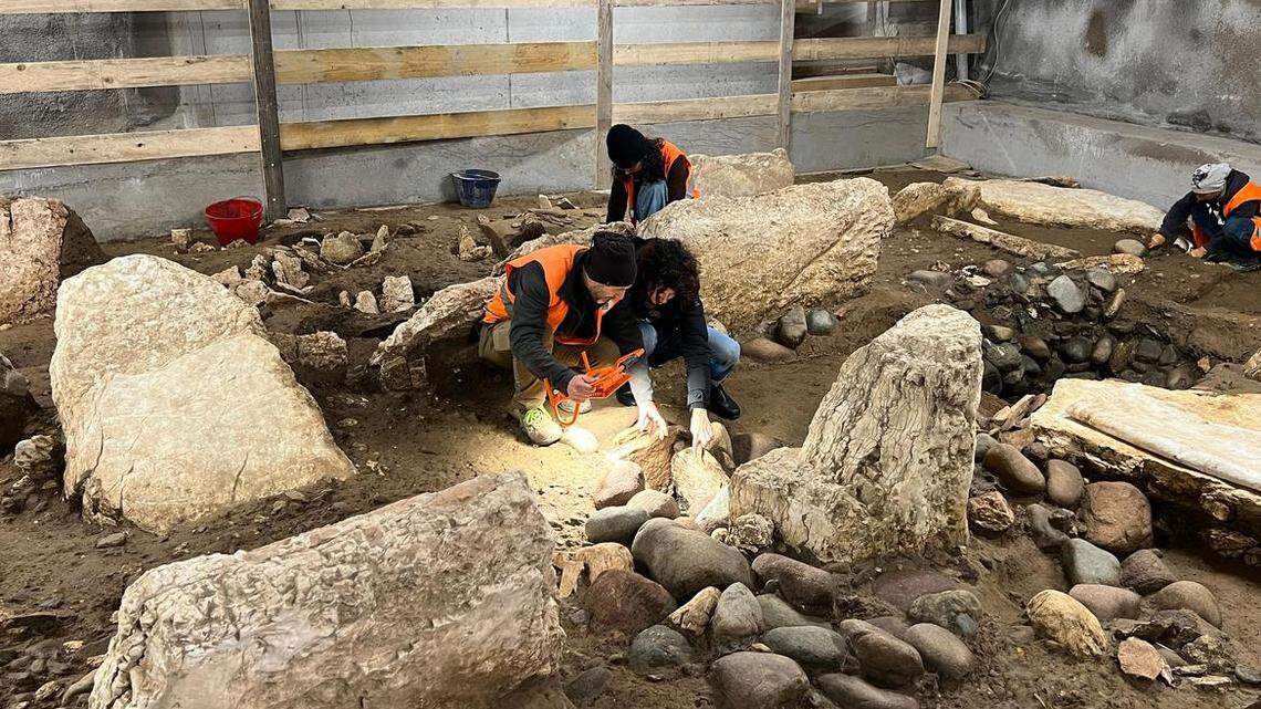 Archaeologists in Trento uncovered at least 200 ancient tombs with tombstones, weapons and other artifacts, photos show.