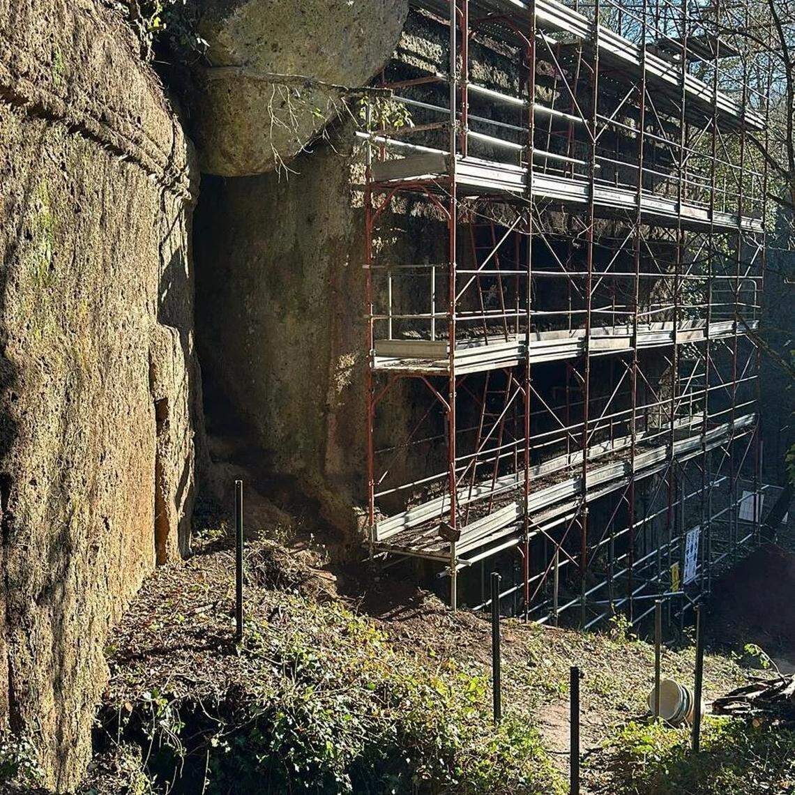 The 2,300-year-old tomb (left) and the Queen’s Tomb (right) during excavations at the rock necropolis of San Giuliano.