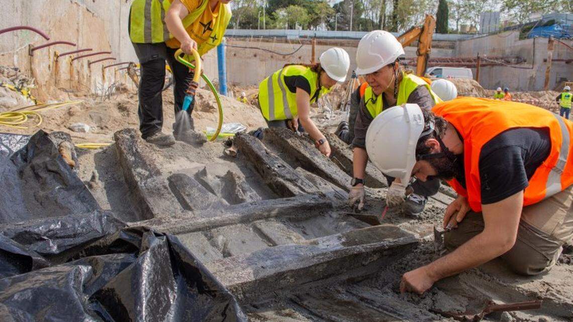 Archaeologists found a 400-year-old shipwreck buried under a construction site in downtown Barcelona, Spain, officials said and photos show.