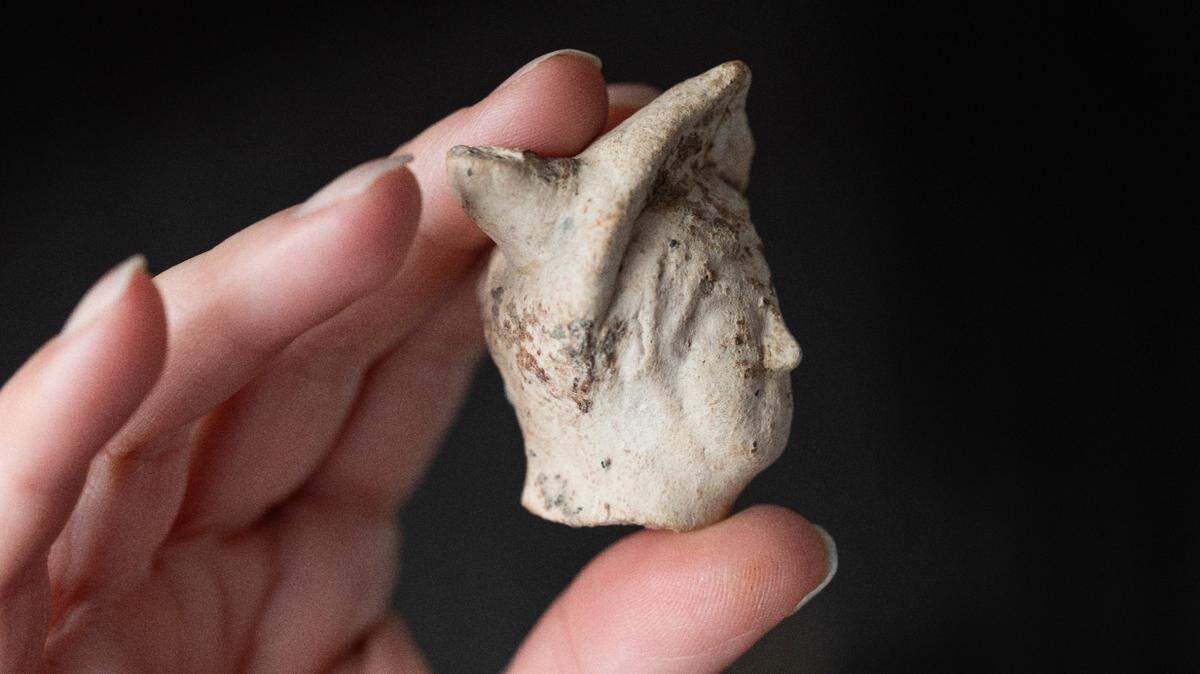 Archaeologists found a 1,700-year-old Roman settlement with an “extremely rare” artifact while excavating a medieval shipyard in Kent, photos show.