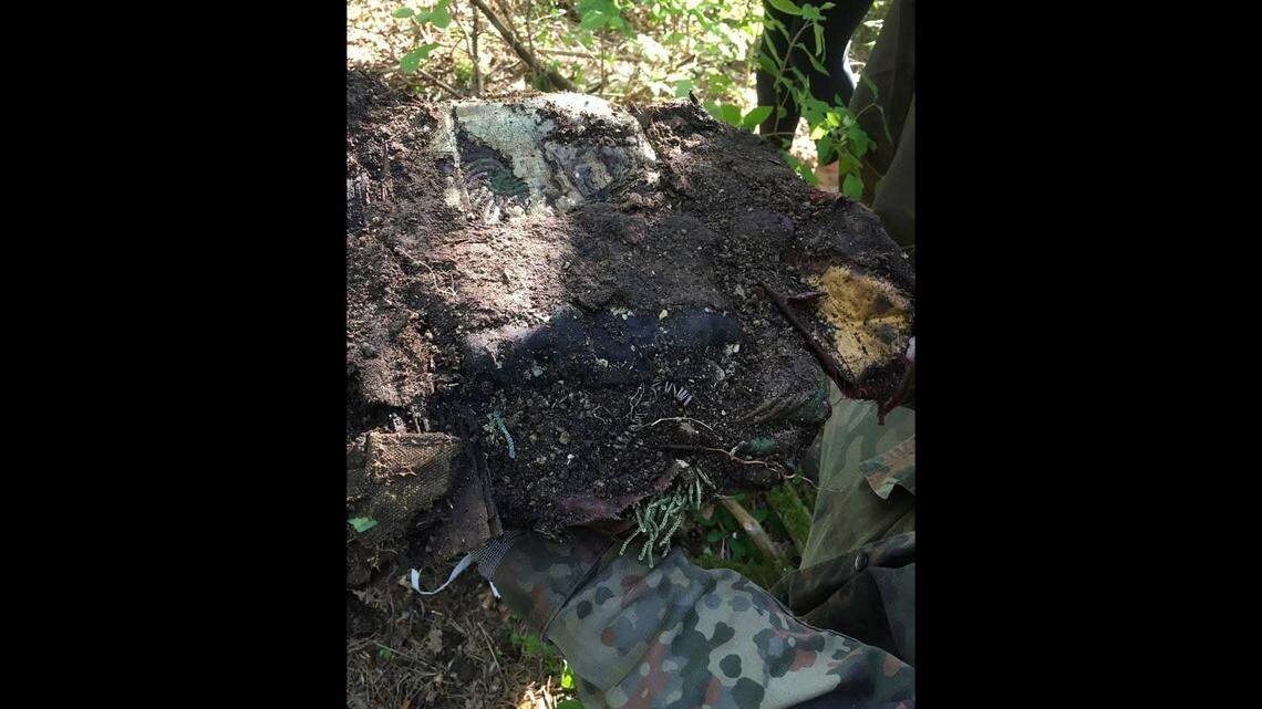 A pair searching the forest near Zielone found the hidden banner, pennant and ribbons of a regiment defeated in WWII, officials said.