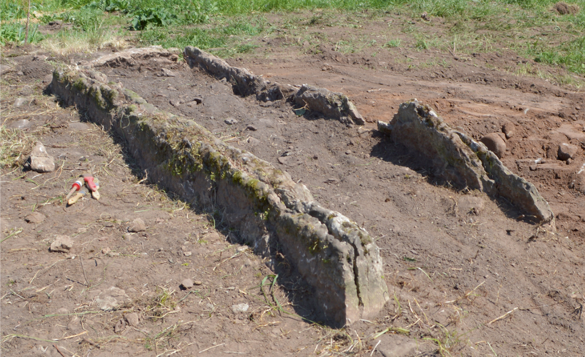 The stone burial chamber, or dolmen, in Tiarp before excavations.