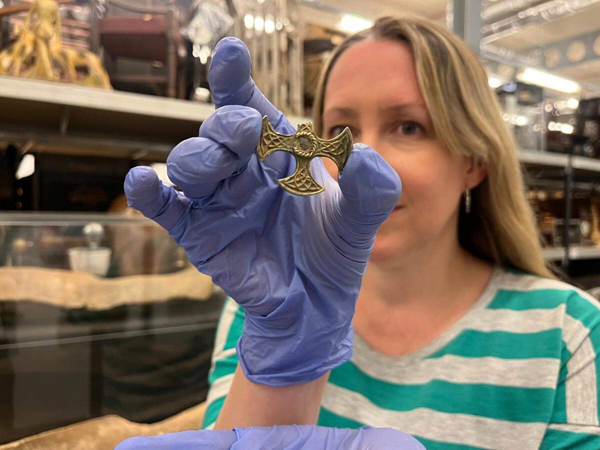 The pendant is made from solid silver and covered in a layer of gold leaf, experts said.