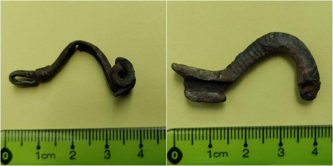 Two ancient Roman pins, or fibulae, found by the metal detectorists.