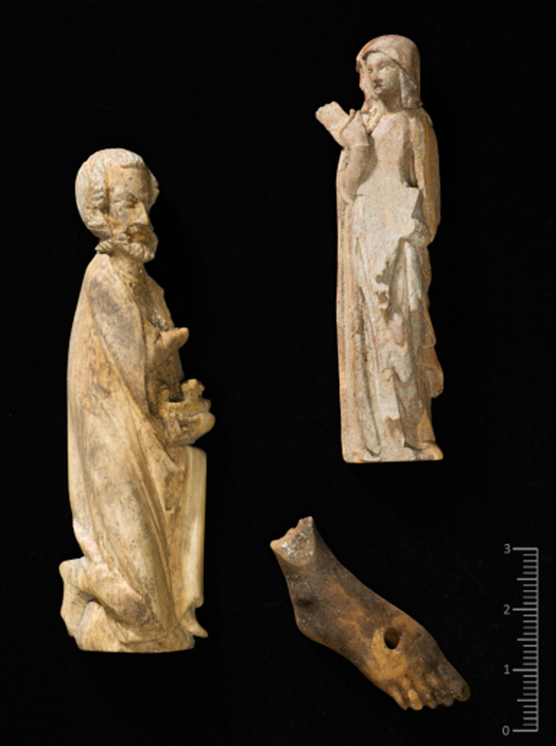 Three figurines that once sat on an altar of the cathedral.