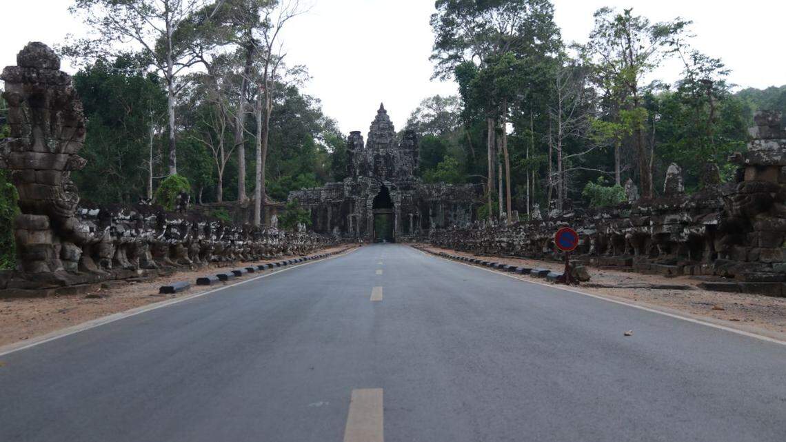 Archaeologists uncovered the missing head of an 800-year-old statue at a dramatic gateway leading into the iconic Angkor Wat complex.