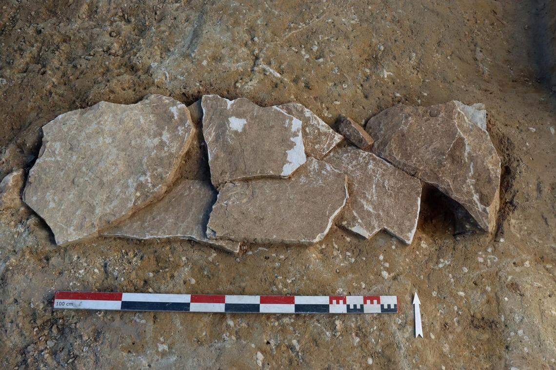 A 1,600-year-old tomb with the tile roof still covering it.