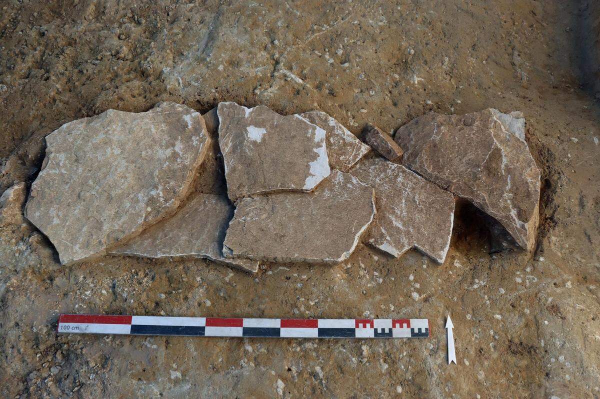 A 1,600-year-old tomb with the tile roof still covering it.