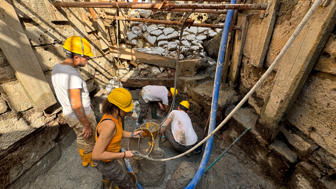 Archaeologists excavating a 2,000-year-old sanctuary in Italy found eggs and bronze figures left in a hot spring as gifts, photos show.
