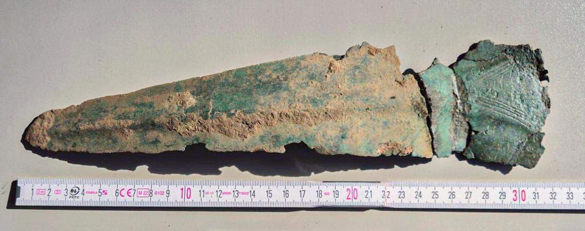 Experts said they believe the daggers were intentionally placed in the dirt vertically.