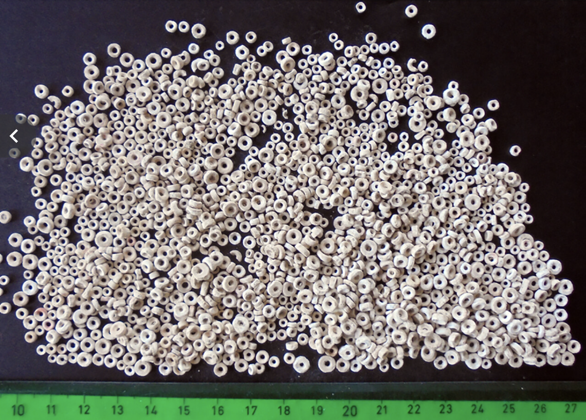 The beads would have been strung together into garments, researchers said.