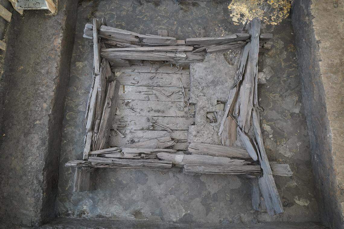 The walls and floor of the ancient burial chamber as seen from above.