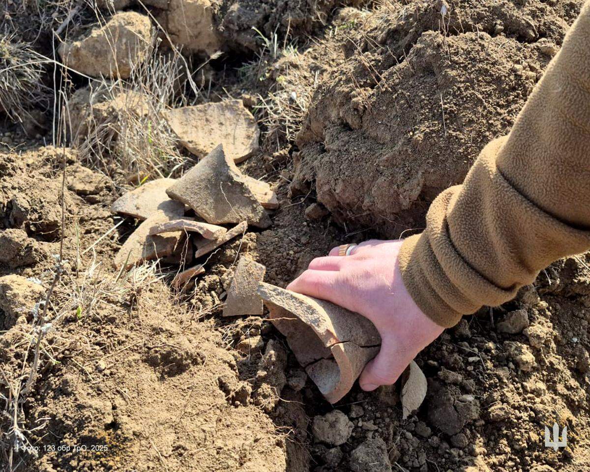 Soldiers found human remains and a three-spouted wine jug at the archaeological site, officials said.