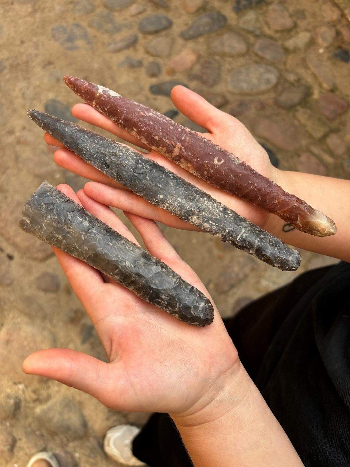 The three daggers found in the 4,000-year-old grave.