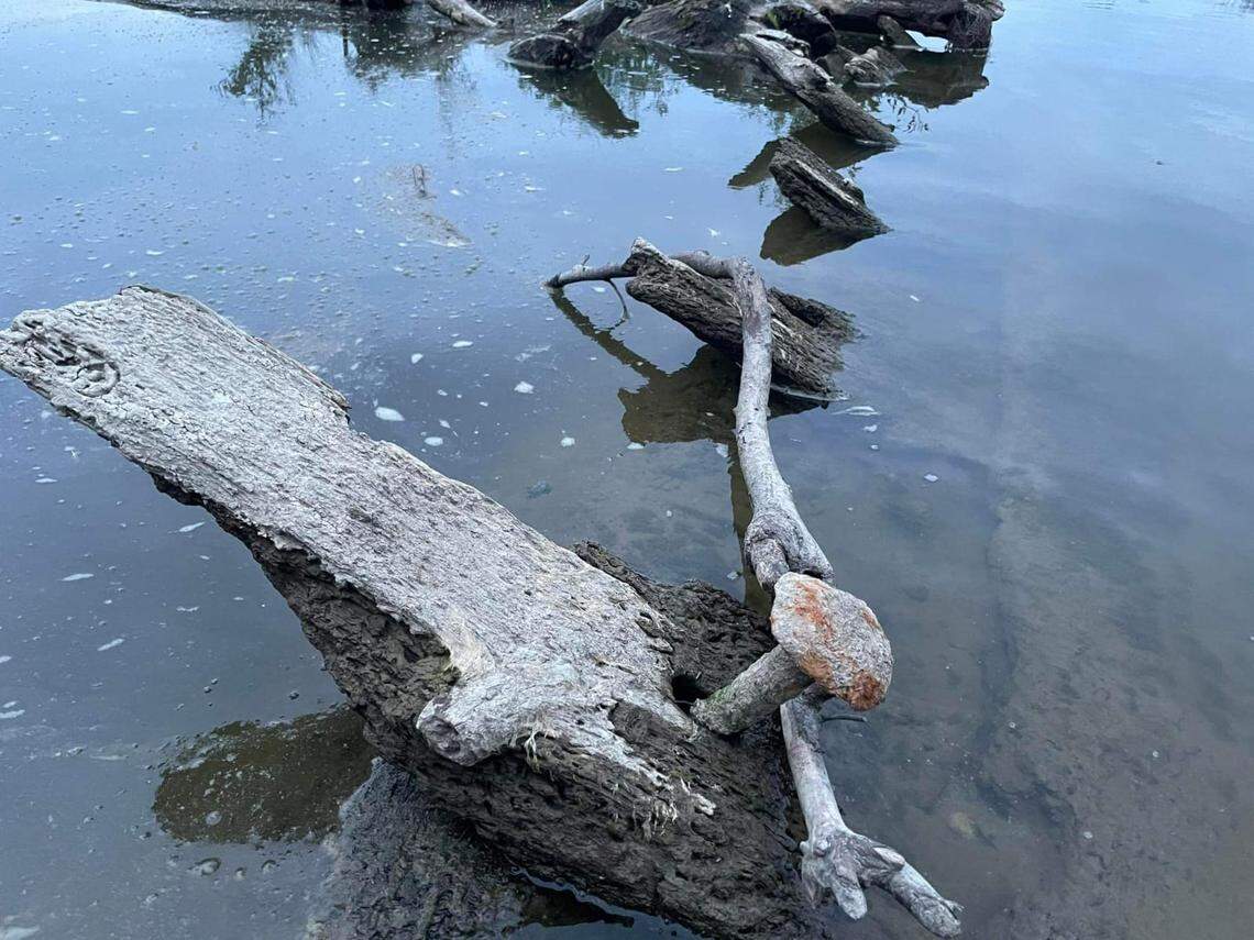The 350-year-old ship still partially submerged in the river.