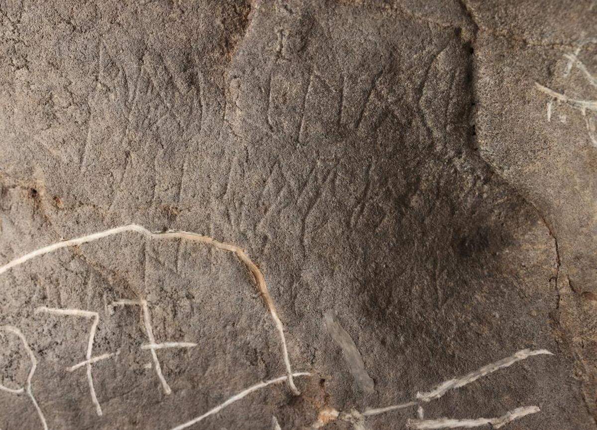 An ancient Roman inscription found at Cova de les Dones.