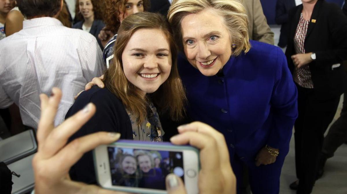 
Democratic presidential candidate Hillary Rodham Clinton poses for a photo during a campaign stop at River Valley Community College on Tuesday in Claremont, New Hampshire.
