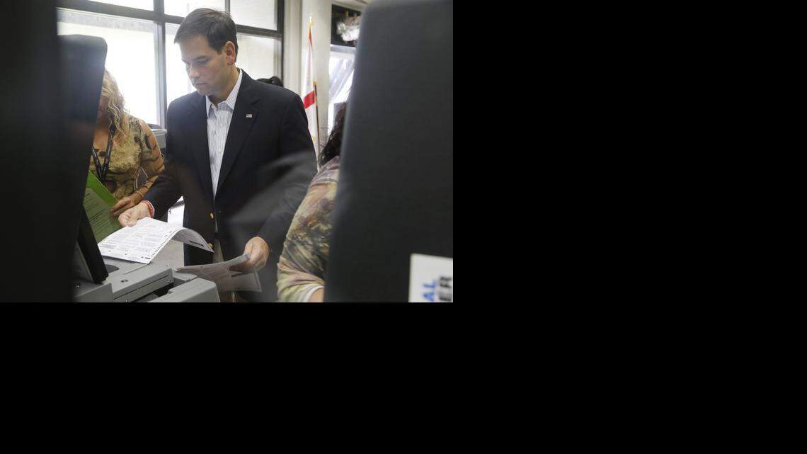 
Sen. Marco Rubio casts his ballot at the West Dade Regional Library in Miami during the first day of early voting in October.
