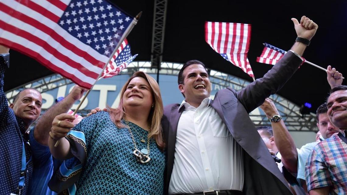 Governor Ricardo Rossello, right, and the Congresswoman representing Puerto Rico, Jennifer Gonzalez, celebrate the results of a referendum on the status of the island at the New Progressive Party headquarters in San Juan, Puerto Rico, Sunday, June 11, 2017.