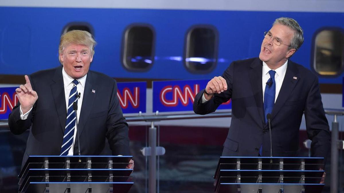 Donald Trump and Jeb Busuh talk over each other during a Republican presidential debate in September.