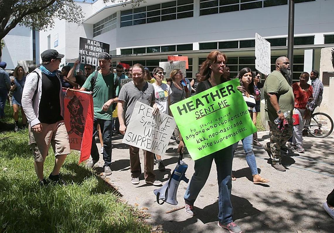 A group of activists marches during a rally against streets named for Confederate generals as the Hollywood City Commission votes on whether to rename streets on Wednesday August 30, 2017.