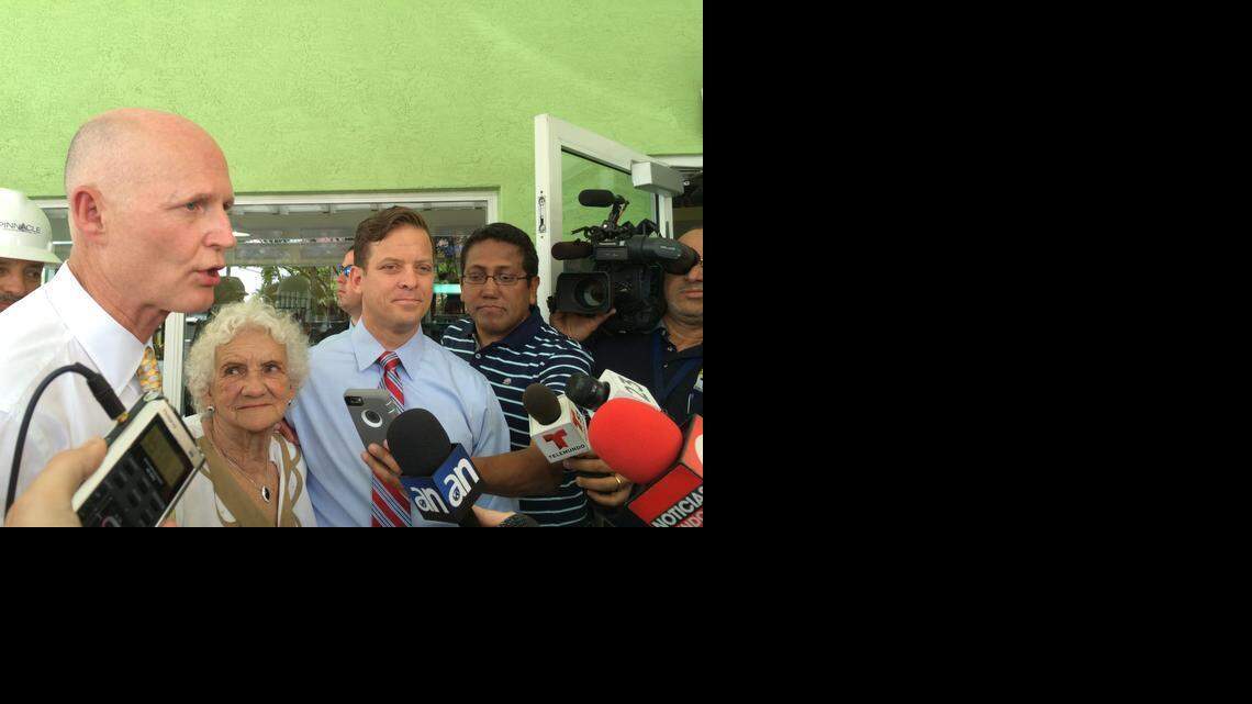 
Florida Gov. Rick Scott speaks to reporters outside Hialeah’s Casa Maiz restaurant Monday.
