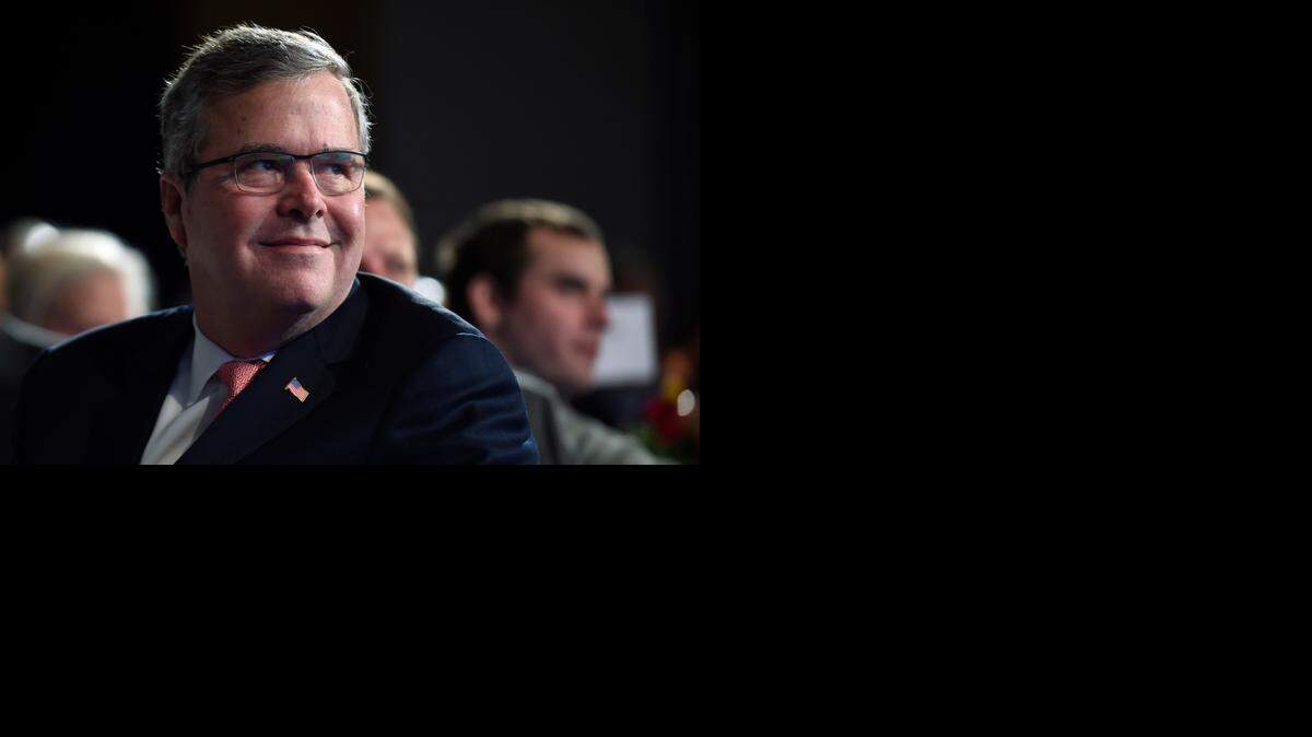 
Former Florida Gov. Jeb Bush listens to a speaker before giving his keynote address at the National Summit on Education Reform in Washington, Thursday, Nov. 20, 2014. He is widely seen by conservative activists as too moderate to be considered the 2016 presidential nominee, but Florida politicians say Bush was a true conservative as the state’s governor.
