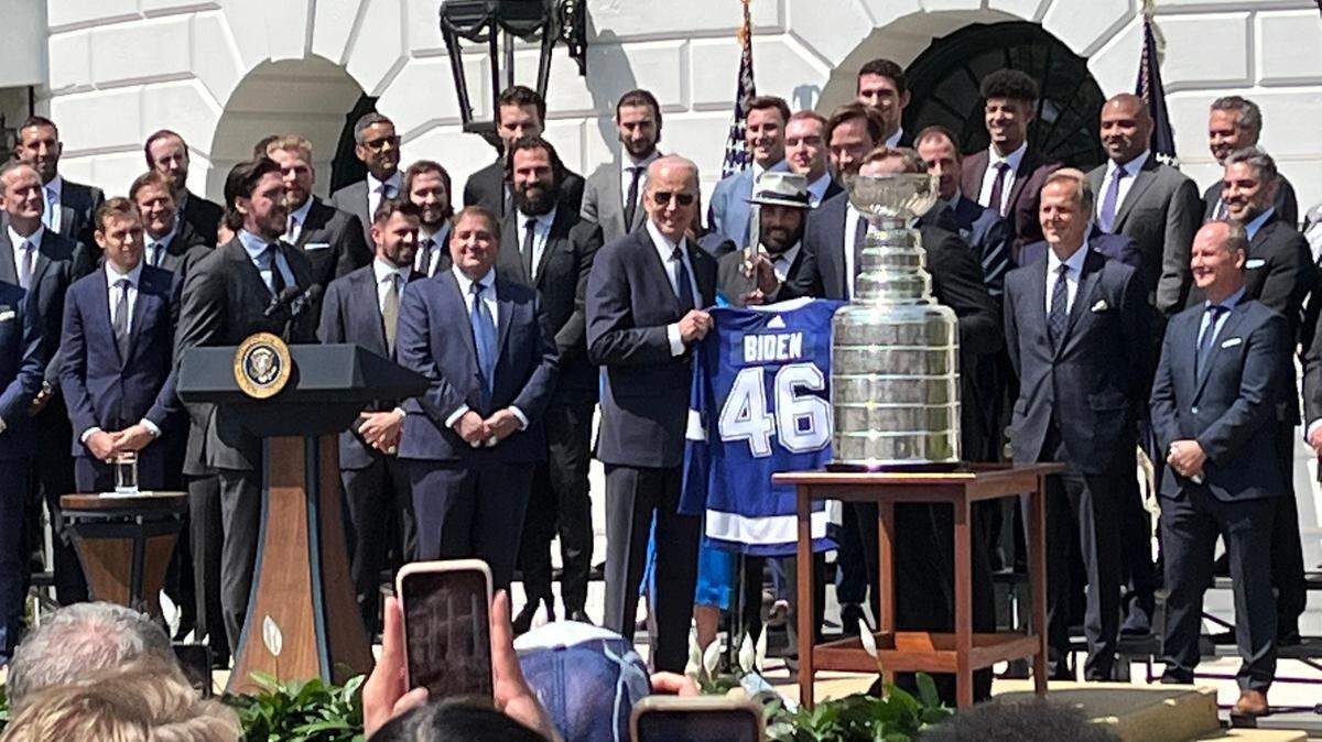 President Joe Biden poses with the Tampa Bay Lightning at the White House in celebration of their back-to-back Stanley Cup wins in 2020 and 2021.