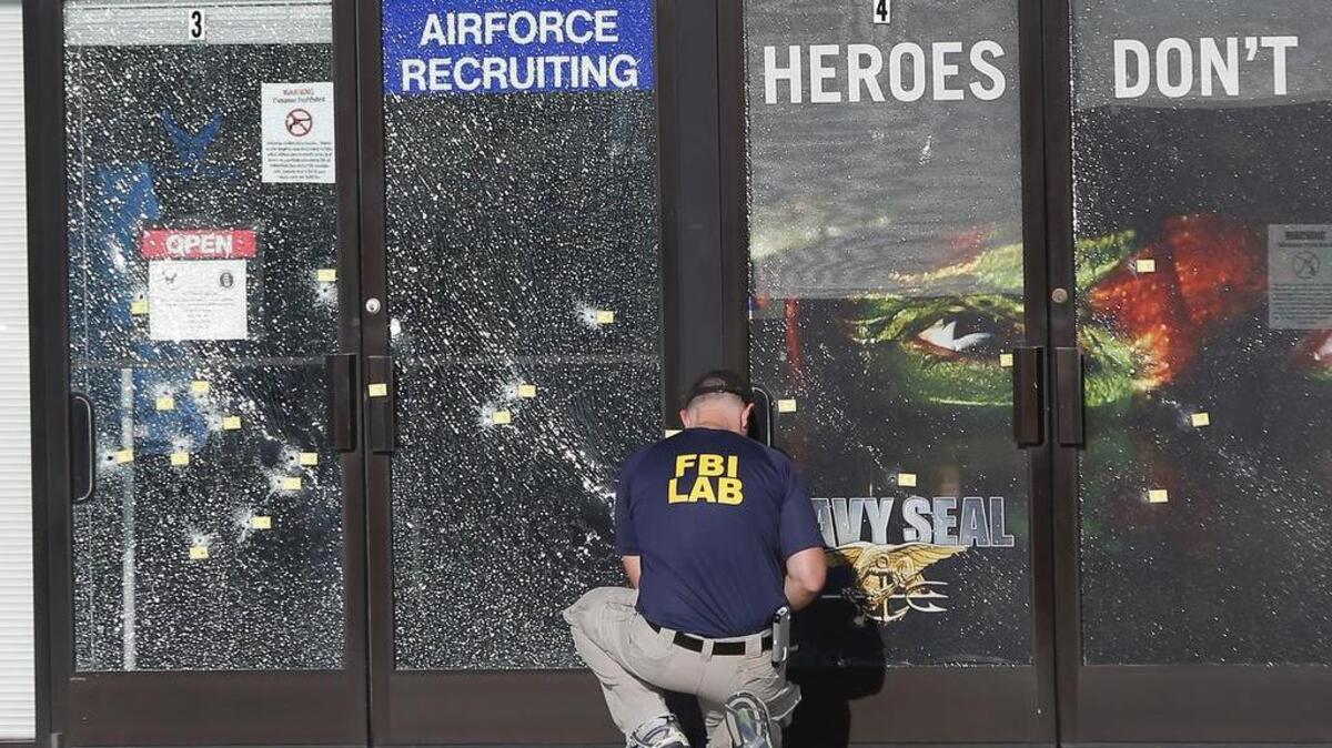 FBI agent examines scene of a shooting outside a military recruiting center in Chattanooga. Former Florida Gov. Jeb Bush’s comments on recruiting offices ruled false.