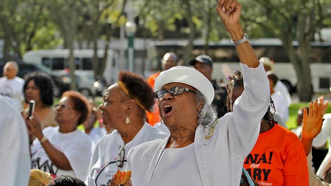 Carolyn Smith, 75, attends a Souls to the Polls gathering outside the Miami-Dade Government Center on Sunday, November 6, 2016.
