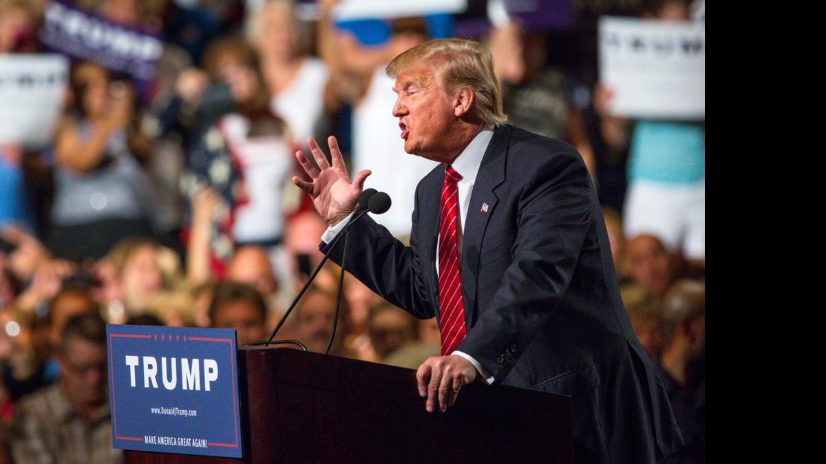 
Republican presidential candidate Donald Trump addresses supporters during a political rally Saturday in Phoenix.
