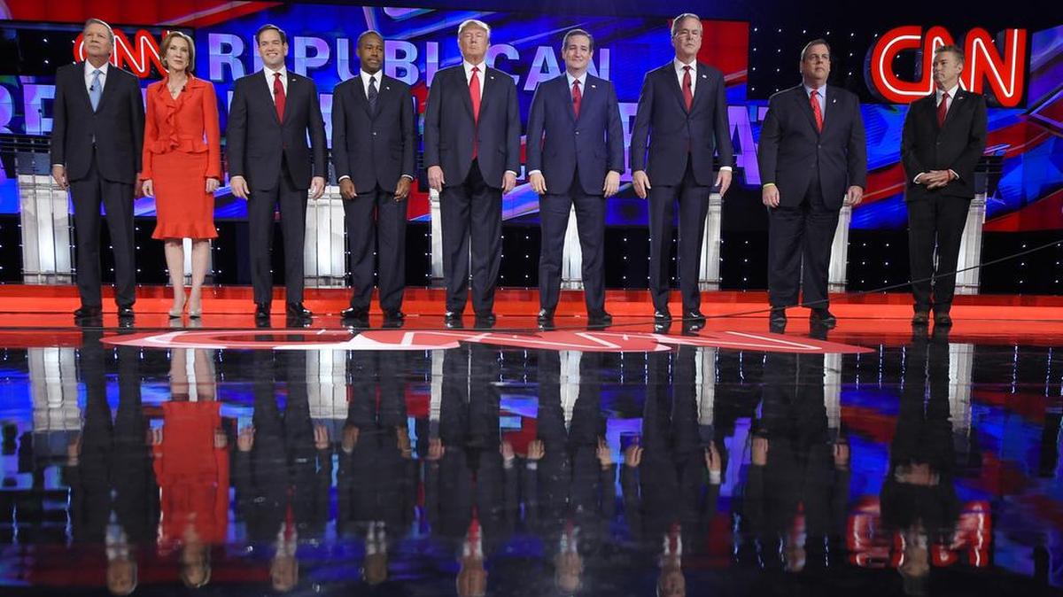 Republican presidential candidates, from left, John Kasich, Carly Fiorina, Marco Rubio, Ben Carson, Donald Trump, Ted Cruz, Jeb Bush, Chris Christie, and Rand Paul take the stage during the CNN Republican presidential debate at the Venetian Hotel & Casino on Tuesday, Dec. 15, 2015, in Las Vegas.