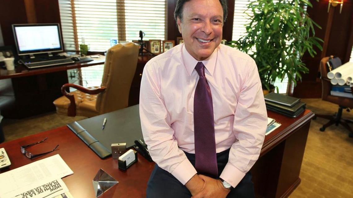 Mike Fernandez, a Coral Gables healthcare magnate and top Jeb Bush financial backer, has launched a newspaper ad campaign against Donald Trump. He is pictured here in his office in 2011.