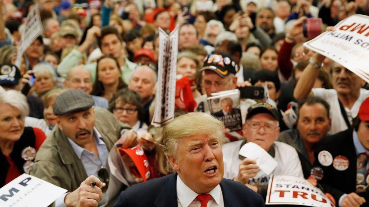 Republican presidential candidate Donald Trump speaks with members of the media during a campaign stop Friday in Myrtle Beach, S.C.