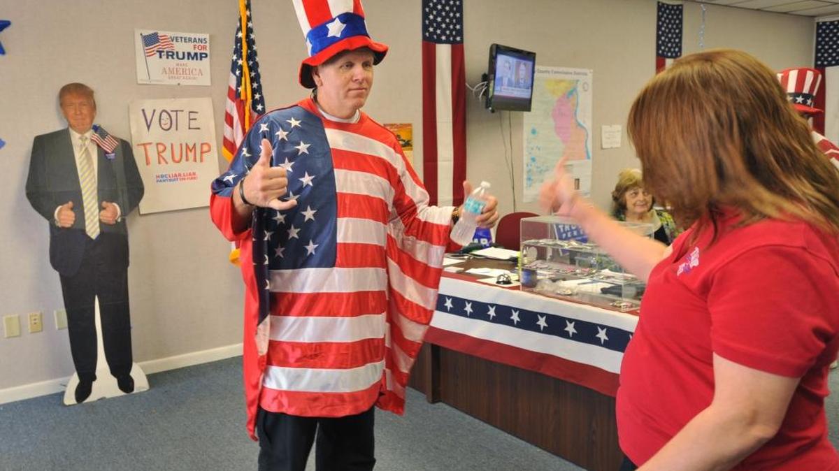 Don Moore, left, talks with Connie Schoenung at the Clay County Republican Party Victory Headquarters on Election Day, Tuesday, Nov. 8, 2016 in Orange Park, Florida.