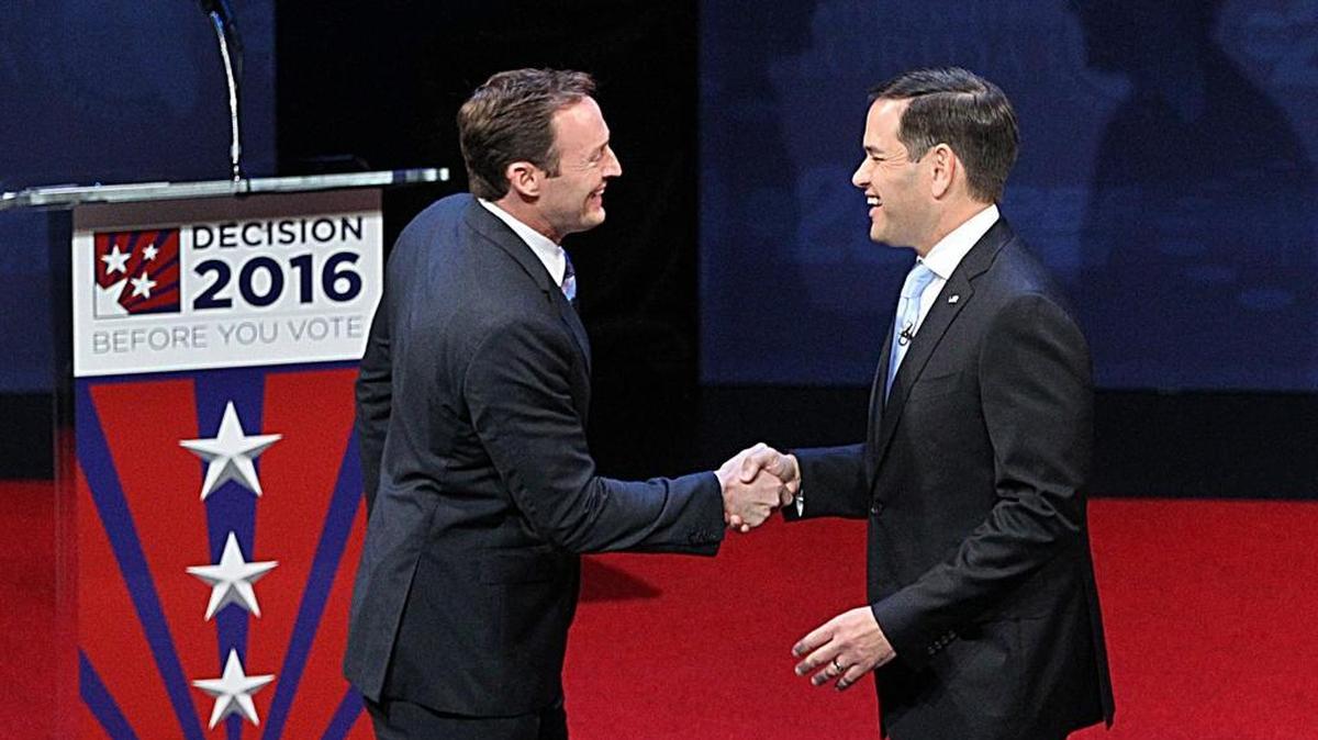 Democrat U.S. Rep. Patrick Murphy, left, and incumbent Republican U.S Sen. Marco Rubio greet each other before their final Senate debate at Broward College in Davie, October 26, 2016,