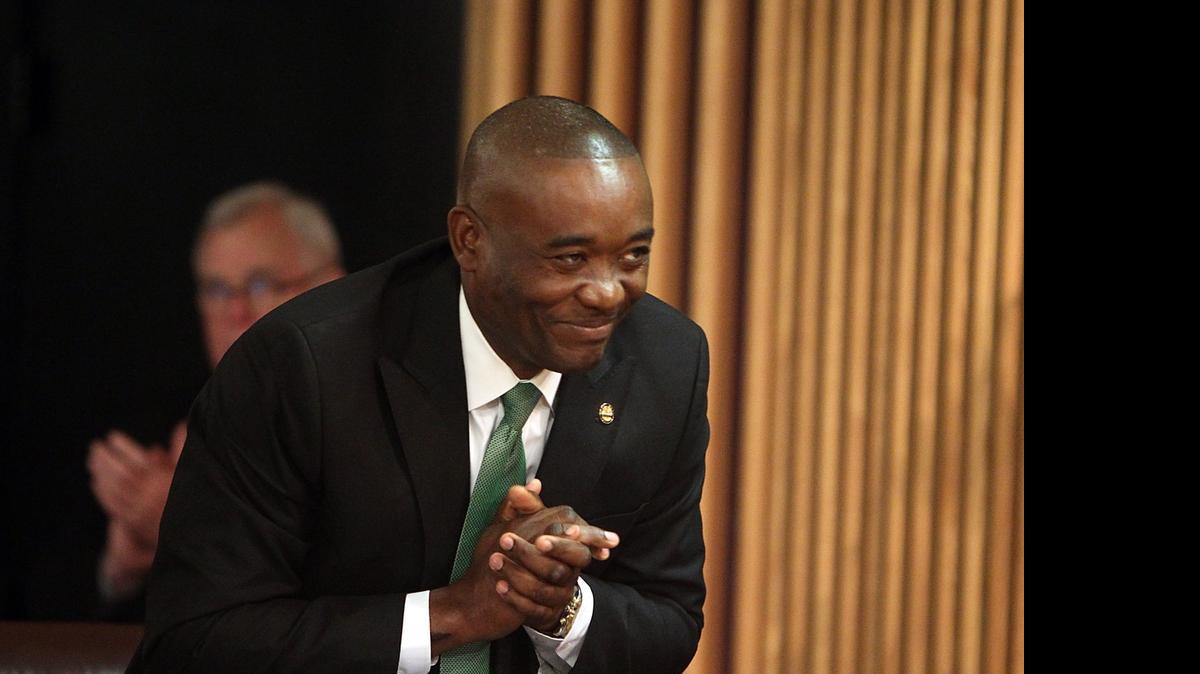 
Jean Monestime bowed to his Miami-Dade County Commission colleagues after they unanimously elected him chairman in November.
