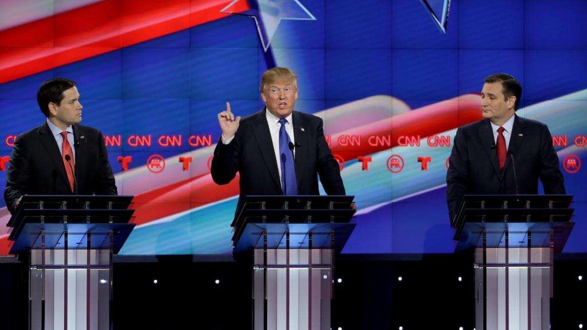 Republican presidential candidate Donald Trump speaks as opponents Marco Rubio, left, and Ted Cruz look on during the GOP presidential primary debate at the University of Houston on Thursday.