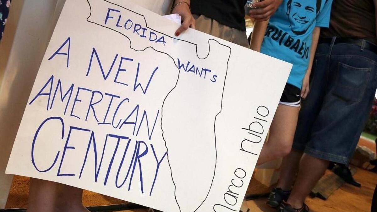 Marco Rubio supporters line up for a rally at Tropical Park in Miami on Tuesday, March 1, 2016.