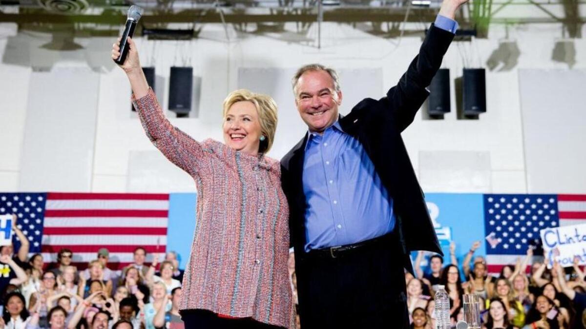 Democratic presidential candidate Hillary Clinton, accompanied by Sen. Tim Kaine, D-Va., speaks at a rally at Northern Virginia Community College in Annandale, Virginia, Thursday, July 14, 2016.