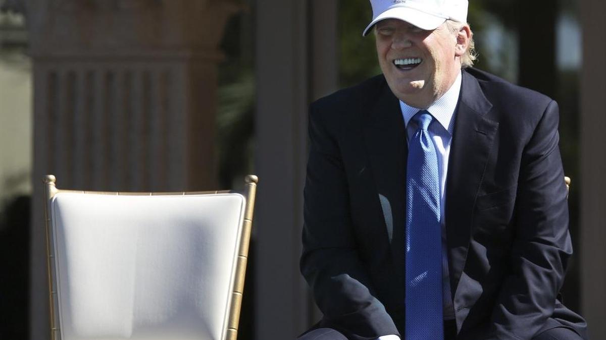 Donald Trump enjoys a hearty laugh during an unveiling ceremony for the Jack Nicklaus Villa at Trump National Doral Miami in February — before he was a presidential candidate.