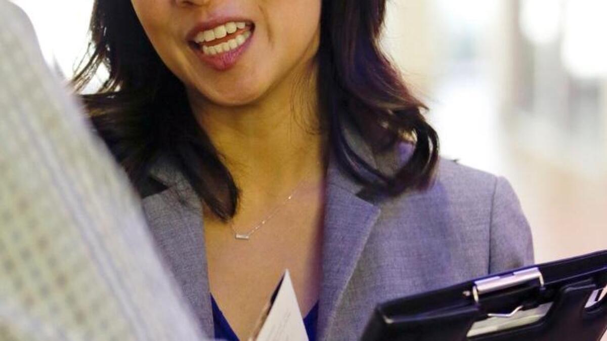 In this photo taken Oct. 18, 2016, Florida Democratic Congressional candidate Stephanie Murphy meets with voters at a senior center in Altamonte Springs. She’s trying to unseat Republican Rep. John Mica, who has served 12 terms in Congress from Central Florida.