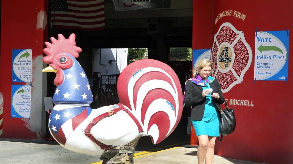 Jessi Bekkin, after voting, leaves the Miami Fire Station at Southwest Second Avenue and 11th Street on Tuesday, March 15, 2016.