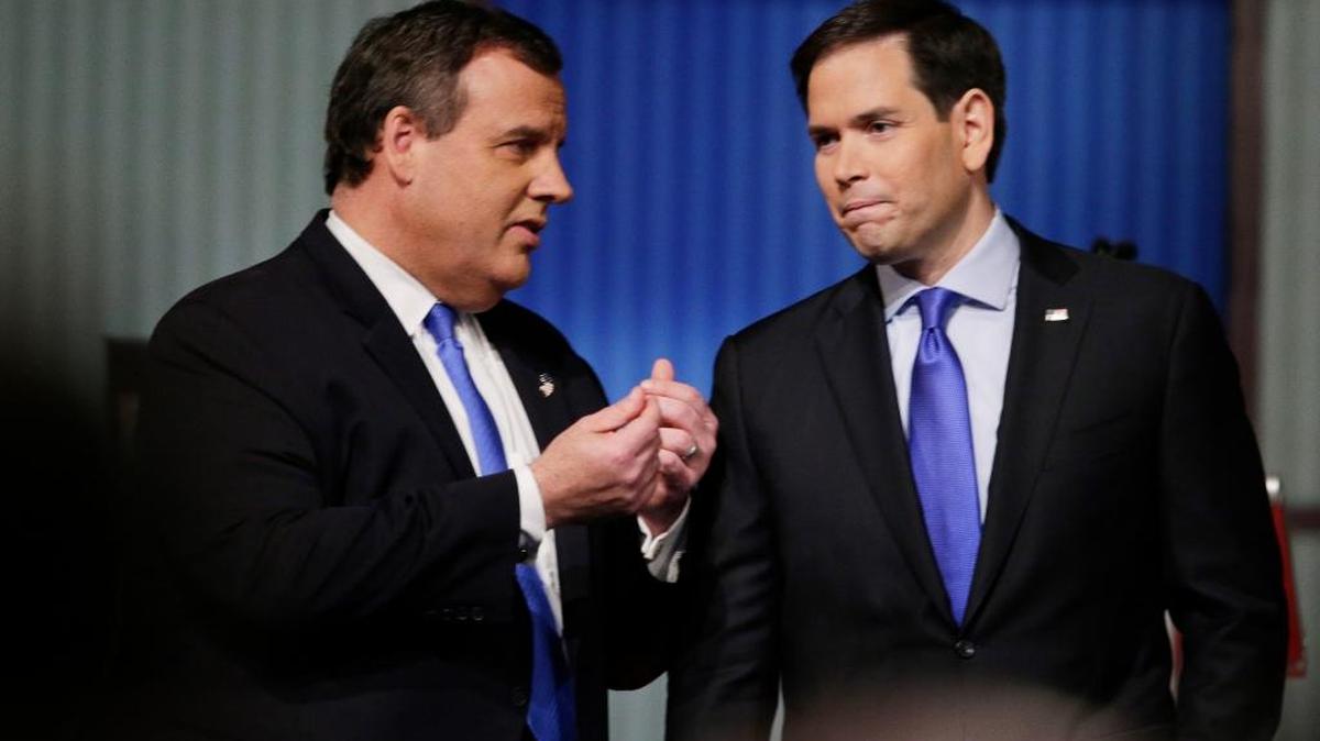 Republican presidential candidate, New Jersey Gov. Chris Christie, speaks with Republican presidential candidate, Sen. Marco Rubio, R-Fla., at a break during the Fox Business Network Republican presidential debate at the North Charleston Coliseum, Thursday, Jan. 14, 2016, in North Charleston, S.C.